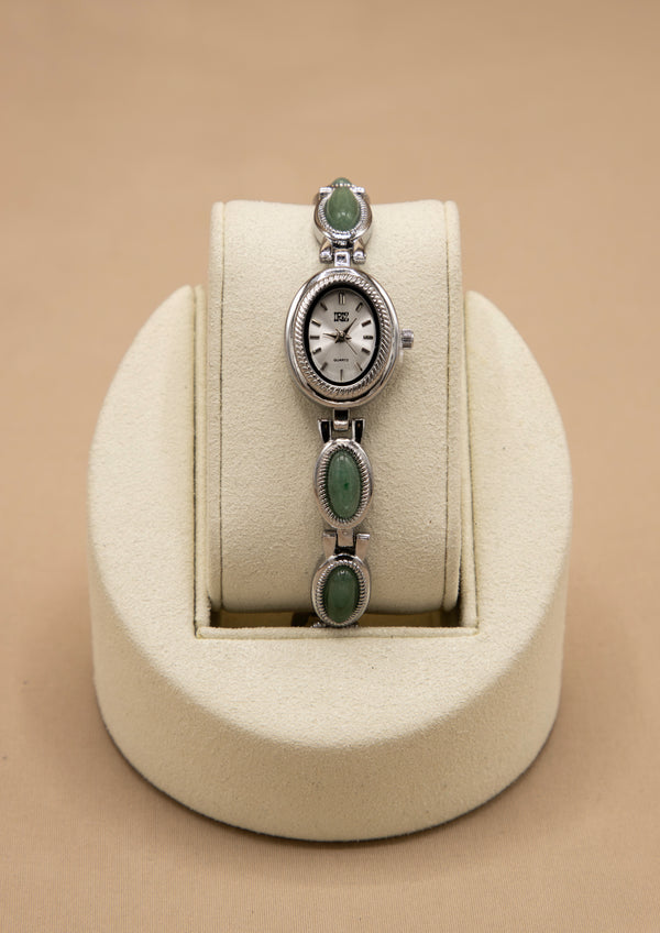 feminine silver oval face watch with jade stone bracelet