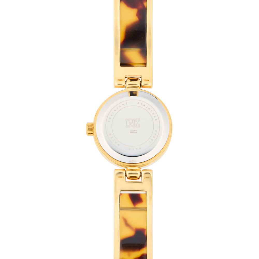 Back of gold and tortoiseshell watch on a white background
