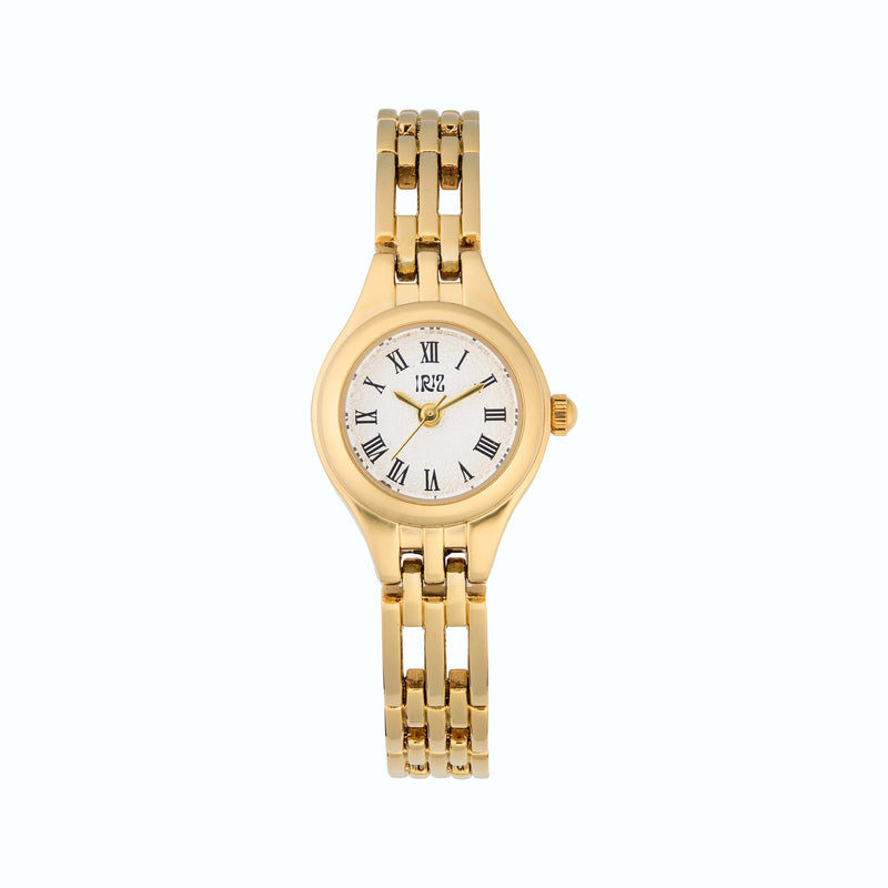 Gold wristwatch with a round, white face and black Roman numerals on a white background