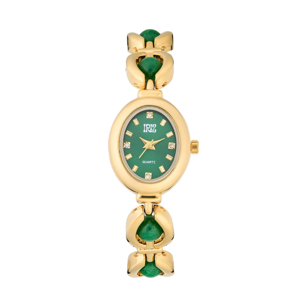 Closeup of Gold and green watch against a white background